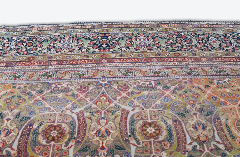Large Tabriz rug restoration