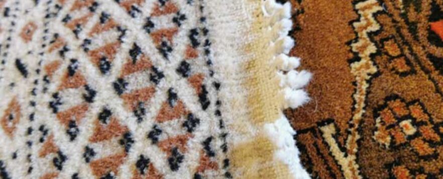 Pakistani Bokhara Hand Knotted Rug Fringe repairs -before
