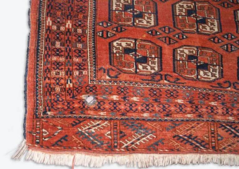 Afghan rug holes repair before Afghan rug holes repair